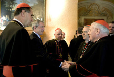 President George W. Bush greets U.S.-based Roman Catholic Cardinals during a reception Thursday, April 7, 2005, in Rome at Villa Taverna, the residence of Mel Sembler, U.S. Ambassador to Italy. From left are: Roger Cardinal Mahony, archbishop of Los Angeles; President Bush; Francis Cardinal George, archbishop of Chicago; Justin Cardinal Rigali, archbishop of Philadelphia, and William Cardinal Keeler, archbishop of Baltimore.