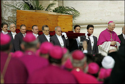 Vatican pallbearers carry the coffin of Pope John Paul II Friday, April 8, 2005, to funeral ceremonies at St. Peter's Square in Rome.