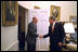 President George W. Bush welcomes Supreme Court Chief Justice William Rehnquist to the Oval Office Dec. 20, 2002. White House photo by Paul Morse