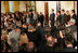 President George W. Bush welcomes an audience to the swearing-in ceremony for U.S. Supreme Court Justice Samuel A. Alito, Tuesday, Feb. 1, 2006 in the East Room of the White House, joined by Altio's wife, Martha-Ann, their son Phil, daughter, Laura, and U.S. Supreme Court Justice John Roberts.