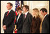 U.S. Supreme Court Justice Samuel A. Alito is seen, Tuesday, Feb. 1, 2006 in the East Room of the White House, with his wife, Martha-Ann, their son Phil, daughter, Laura, and U.S. Supreme Court Chief Justice John Roberts prior to being sworn-in.