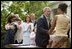 President George W. Bush greets Tamara Brooks after signing the S. 151, PROTECT Act of 2003, in the Rose Garden Wednesday, April 30, 2003. Brooks, 17, was rescued after an AMBER Alert was issued throughout Orange County, Calif., alerting the community of her abduction. Donna Norris, left, embraces her son Ricky after the bill signing. The AMBER Alert system is named in honor of her 9-year-old daughter, Amber Hagerman, who was abducted while playing near her Arlington, Texas, home and later found murdered. 