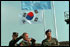 President George W. Bush is given a tour of the North Korean border by Lt. Col. William Miller, left, and General Thomas Schwartz from Observation Post Ouellette near Camp Bonifas in South Korea, Wednesday, Feb. 20, 2002. White House photo by Eric Draper.