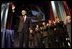 President George W. Bush addresses the 85th Annual American Legion Convention in St. Louis, Mo., Tuesday, Aug. 26, 2003. "In the 20th century, the American flag and the American uniform stood for something unique in history," President Bush said in his remarks. "America's armed forces humbled tyrants and raised up and befriended nations that once fought against us."