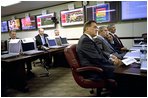 Accompanied by Governor Ridge and White House Chief of Staff Andrew Card, President Bush visits the Homeland Security Complex in Washington, D.C., Sept. 19, 2002. 