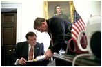 Governor Ridge talks with Attorney General John Ashcroft outside the Oval Office Nov. 28, 2001. Coordinating intelligence efforts with the FBI, CIA and Justice Department, Secretary Ridge meets routinely with his colleagues.