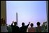 The two leaders and their wives wave to one of the most crowded State Arrival Ceremonies in recent memory. "Today, Laura and I are honored to welcome (President Kwasniewski) and the First Lady to an America that is proud to call Poland friend and ally, and a partner," said President Bush.