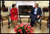 Proceeding from public ceremony to private talks, Philippine President Gloria Macapagal-Arroyo and President George W. Bush meet in the Oval Office Monday, May 19, 2003. 