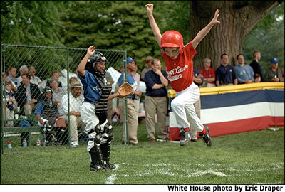 The Rockies score a run. White House photo by Eric Draper.