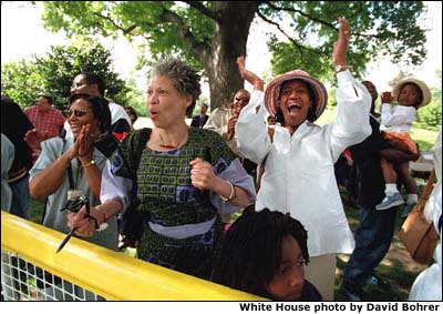 Family and friends of the Memphis Red Sox cheer their team. White House photo by David Bohrer