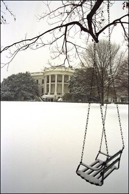 A blanket of snow covers the South Lawn of the White House, Thursday, Dec. 5, 2002. 