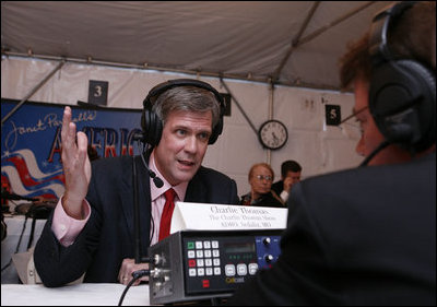 White House Press Secretary Tony Snow speaks with radio host Charlie Thomas of KDRO radio from Sedalia, Mo., during the White House Radio Day event Tuesday, Oct. 24, 2006 in Washington, D.C.