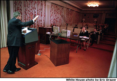 President Bush prepares the State of the Union address in the family theater of the White House with senior staff Monday, January 29. White House photo by Eric Draper.