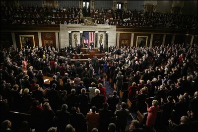 President George W. Bush arrives at the House Chamber of the U.S. Capitol to deliver his State of the Union Address to the nation and a joint session of Congress, Jan. 20, 2004.