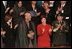 Hamid Karzai, center, Chairman of the Afghan Interim Authority, receives a standing ovation during President George W. Bush's State of the Union Address in the U. S. Capitol, Jan. 29, 2002.