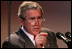 President George W. Bush goes through his speech Tuesday, Feb. 1, 2005, in the Family Theater of the White House in preparation for his scheduled address to the nation Wednesday.