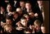 President George W. Bush waves to a crowd of Congressional Pages after delivering his fourth State of the Union Address at the U.S. Capitol, Wednesday, Feb. 2, 2005. 