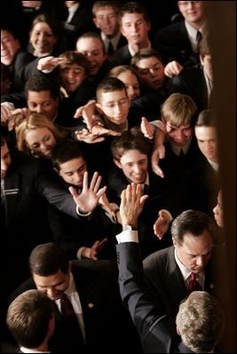 President George W. Bush waves to a crowd of Congressional Pages after delivering his fourth State of the Union Address at the U.S. Capitol, Wednesday, Feb. 2, 2005. 