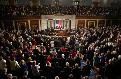 The House comes to its feet as President George W. Bush arrives at the podium Tuesday, Jan. 31, 2006, to give his State of the Union address.