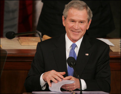 President George W. Bush smiles as he's applauded during Tuesday's 2006 State of the Union address.