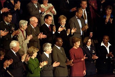 Laura Bush waves as she is applauded during President Bush's State of the Union speech at the U.S. Capitol Tuesday, Jan. 28, 2003. 