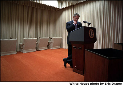 President Bush reviews the State of the Union speech in the family theater of the White House Jan. 29. White House photo by Eric Draper.