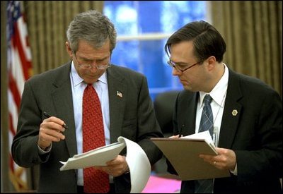 President Bush reviews the text with Director of Presidential Speechwriting Michael Gerson in the Oval Office, Jan. 23, 2003. 