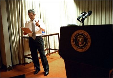 After days of revisions and rehearsals, President Bush reads through his State of the Union speech during a late afternoon practice session in the family theater of the White House Monday, Jan. 27, 2003.