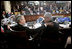 President George W. Bush shares a moment Saturday, Nov. 5, 2005, with President Alfredo Palacio of Ecuador during the final session of the 2005 Summit of the Americas in Mar del Plata, Argentina.