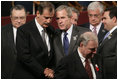 President George W. Bush spends a moment with Mexico's President Vicente Fox following the opening ceremonies Friday, Nov. 4, 2005, of the 2005 Summit of the Americas at the Teatro Auditorium in Mar del Plata, Argentina.