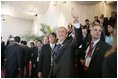 President George W. Bush gives the thumbs-up to well-wishers Friday, Nov. 4, 2005, as he attended the opening ceremonies of the 2005 Summit of the Americas at the Teatro Auditorium in Mar del Plata, Argentina.