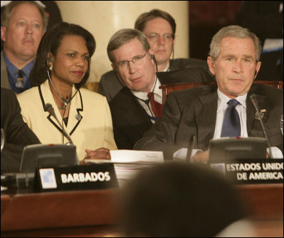 President George W. Bush, Secretary of State Condoleezza Rice and National Security Council Advisor Steve Hadley listen to opening statements Friday, Nov. 4, 2005, at the Summit of the Americas in Mar del Plata, Argentina.