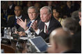 President George W. Bush and Secretary of State Condoleezza Rice listen as Prime Minister Paul Marten of Canada speaks Friday, Nov. 4, 2005, during the opening session of the 2005 Summit of the Americas in Mar del Plata, Argentina.