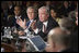 President George W. Bush and Secretary of State Condoleezza Rice listen as Prime Minister Paul Marten of Canada speaks Friday, Nov. 4, 2005, during the opening session of the 2005 Summit of the Americas in Mar del Plata, Argentina.