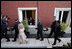 President George W. Bush acknowledges a salute from a well-wisher Friday, Nov. 4, 2005, during the opening ceremonies in Mar del Plata, Argentina, for the 2005 Summit of the Americas.