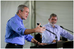 President George W. Bush speaks during a joint press statement with Brazilian President Luiz Inacio Lula da Sliva at the Granja do Torto in Brasilia, Brazil, Sunday, Nov. 6, 2005. 