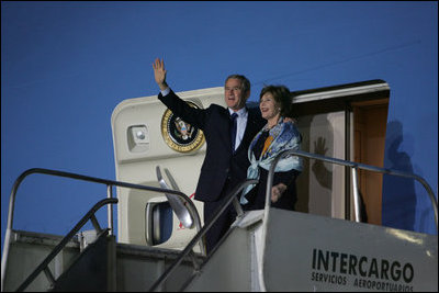 President George W. Bush and Laura Bush wave from Air Force One after landing Thursday, Nov. 3, 2005, in Mar del Plata, Argentina, where the President will participate in the Summit of the Americas. 