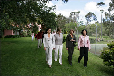 Mrs. Laura Bush walks with women leaders during her visit Friday, Nov. 4, 2005, to Estancia Santa Isabel, a ranch near Mar del Plata, site of the 2005 Summit of the Americas. 