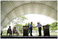 President George W. Bush and Brazil President Luiz Inacio Lula da Silva exchange handshakes Saturday, Nov. 6, 2005, after they delivered joint statements at the Brazil President's home, Granja do Torto. 