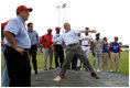 President George W. Bush delivers a pitch from the mound during a baseball event with Major League baseball players and Panamanian youth, Monday, Nov. 7, 2005 in Panama City, Panama. 