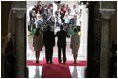 President and Mrs. Bush and President Martin Torrijos of Panama, and Mrs. Torrijos, face the media after the Bush's arrival Monday, Nov. 7, 2005, at the Palacio de Las Garzas in Panama City, Panama. 