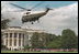 President George W. Bush arrives aboard Marine One from Camp David for the tee-ball game on the South Lawn event Sunday, May 7, 2001.