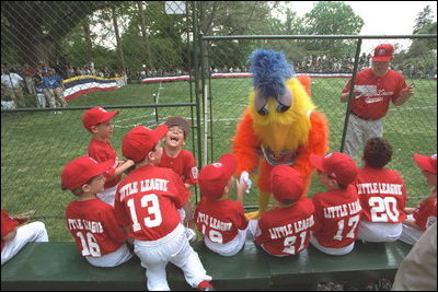 The San Diego Chicken visits the Rockies dugout before the game begins during a tee-ball game on the South Lawn May 6, 2001.