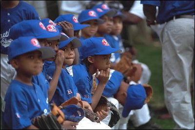 Action became a nail biter in the Memphis Red Sox dugout during a tee-ball game on the South Lawn May 6, 2001.