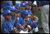 Action became a nail biter in the Memphis Red Sox dugout during a tee-ball game on the South Lawn May 6, 2001.