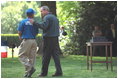 The Memphis Red Sox vs. Rockies tee-ball game on the South Lawn of the White House May 7, 2001.