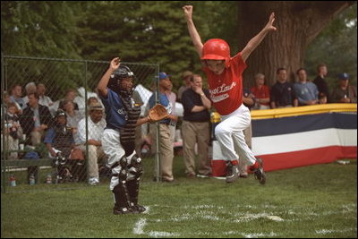 The Rockies score a run during a tee-ball game on the South Lawn May 6, 2001.