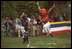 The Rockies score a run during a tee-ball game on the South Lawn May 6, 2001.