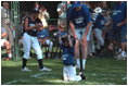 Rounding bases amid cheers and applause, coming home is always a cause for celebration during the third Tee Ball game on the South Lawn on Sunday, July 15, 2001.