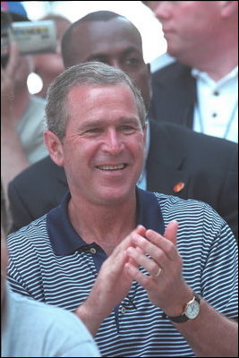 Smiles were aplenty as a sunny summer's afternoon made for a perfect day to remember past baseball games while watching new ones during the third Tee Ball game on the South Lawn on Sunday, July 15, 2001.